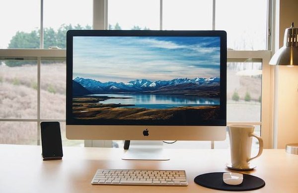 Les avantages et les inconvénients de l'utilisation d'un Mac par rapport à un PC pour la productivité professionnelle